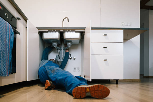 Professional Drain Cleaning technician working in Villas, FL